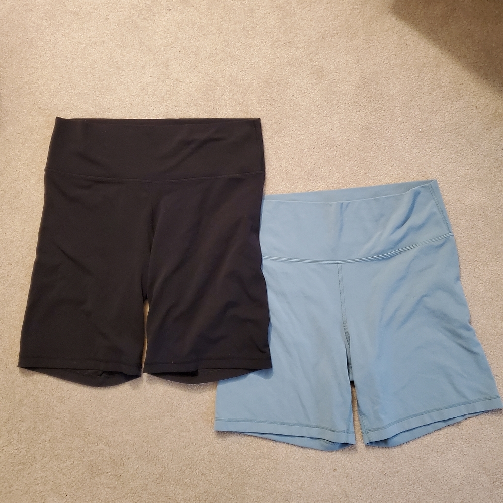 Two pairs of TNA biker shorts 1X